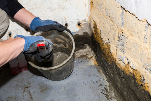 How do you seal a leaking concrete slab
